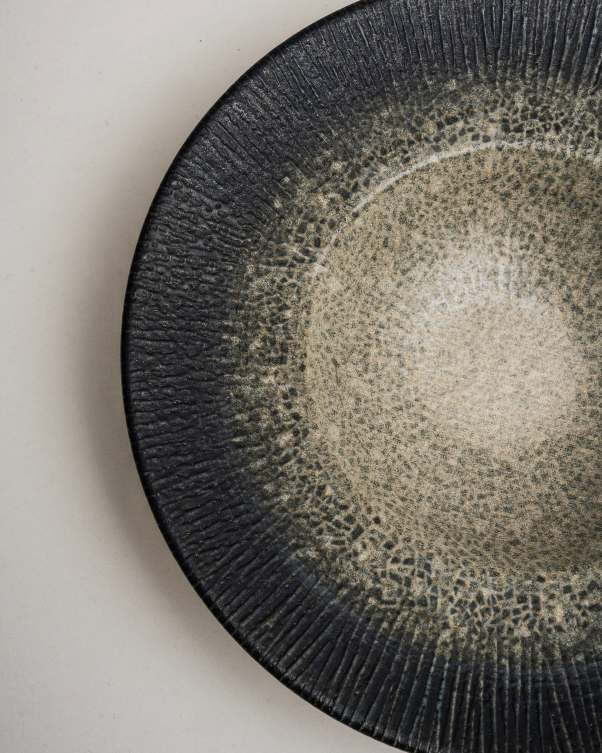 Overhead view of Arctic porcelain banquet plate, gradient pattern visible