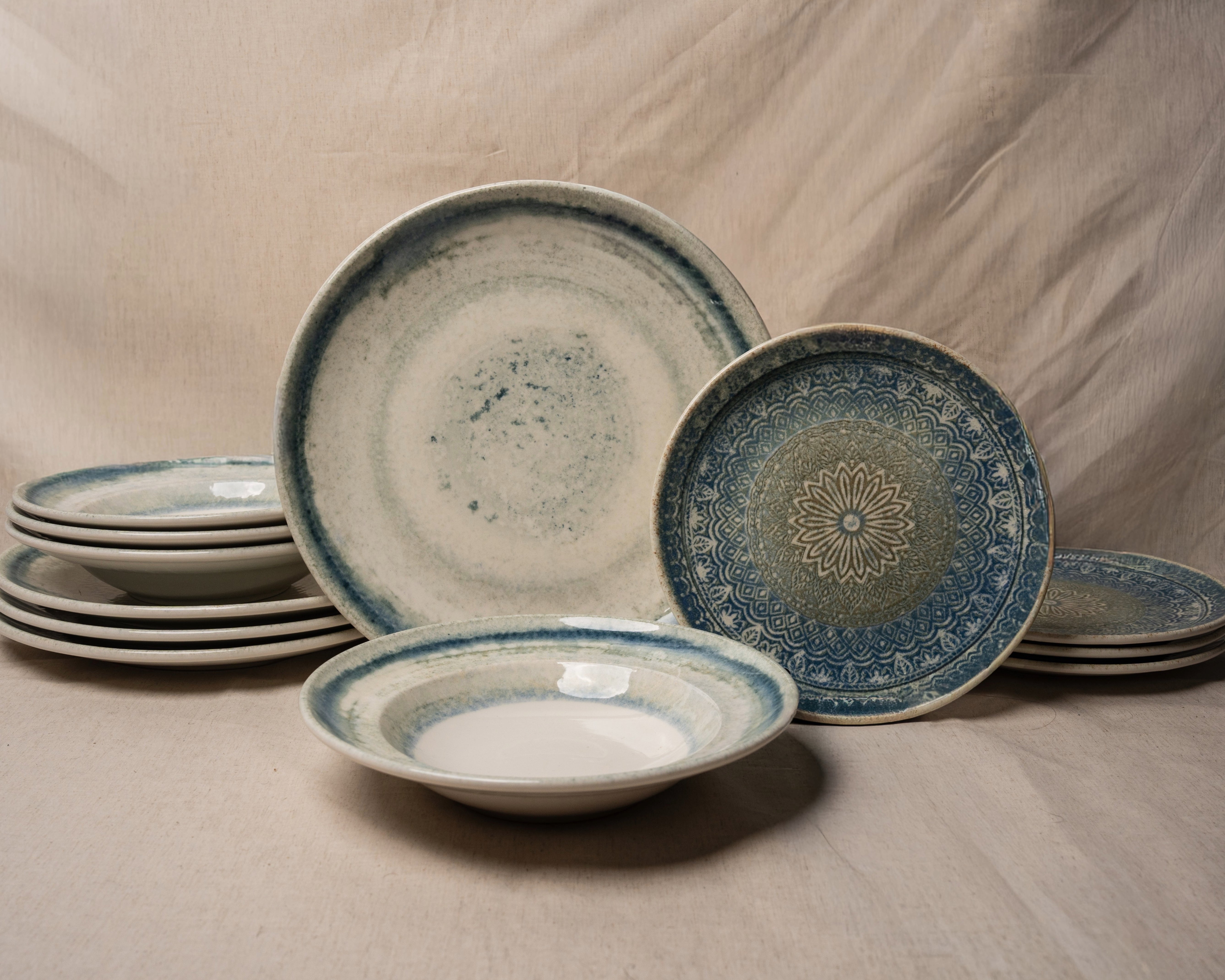 Atlantis porcelain dinnerware set, blue-rimmed glaze, full 12-piece collection