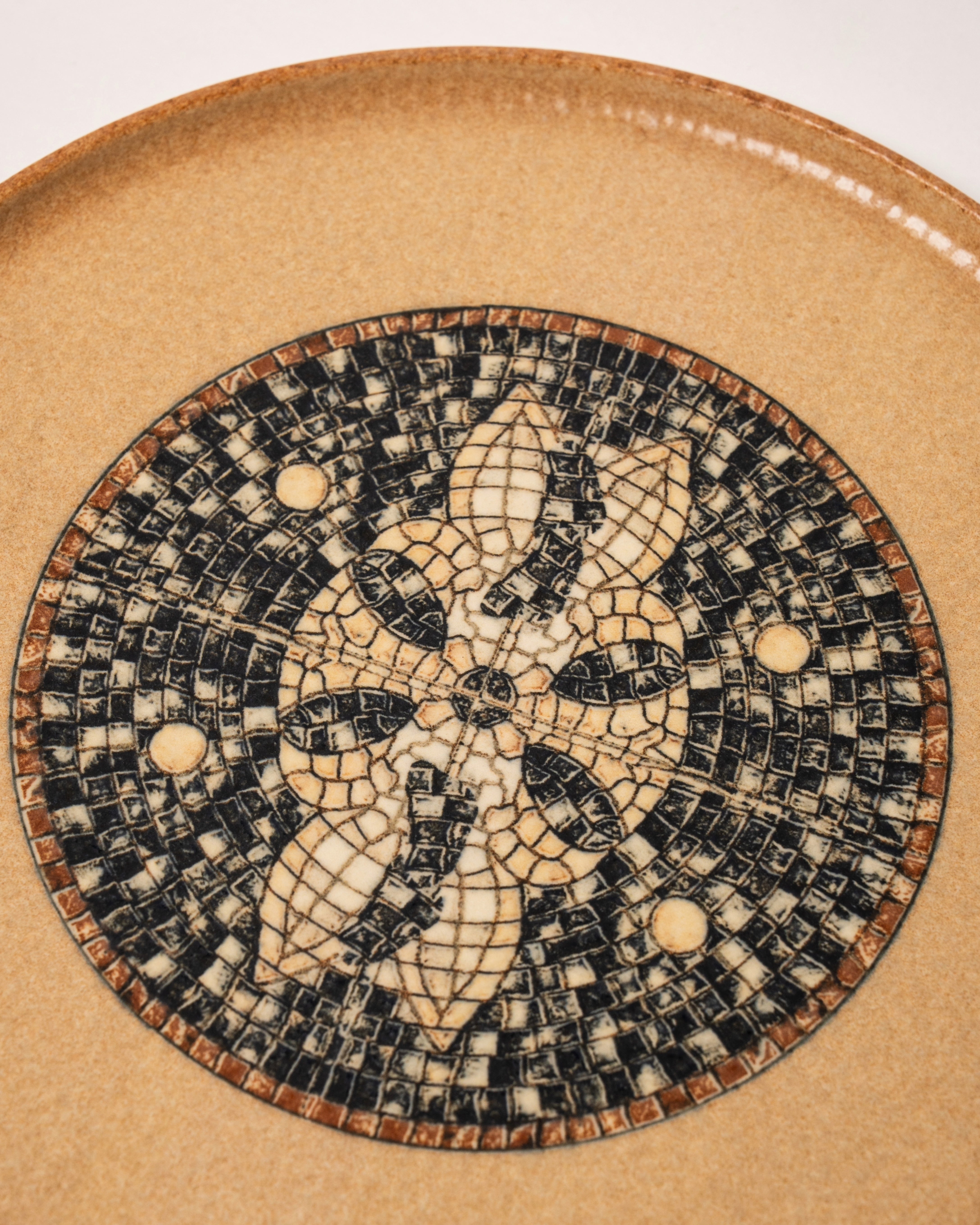 Overhead view of Bee Mosaïque Beige porcelain dinner plate showing mosaic detail