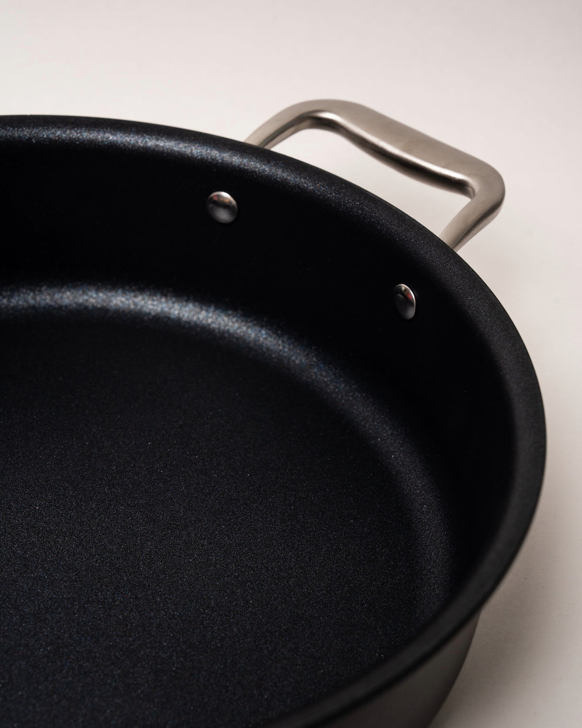 Angled view of BioDiamond diamond-coated pot, 10.2 inch, black non-stick finish