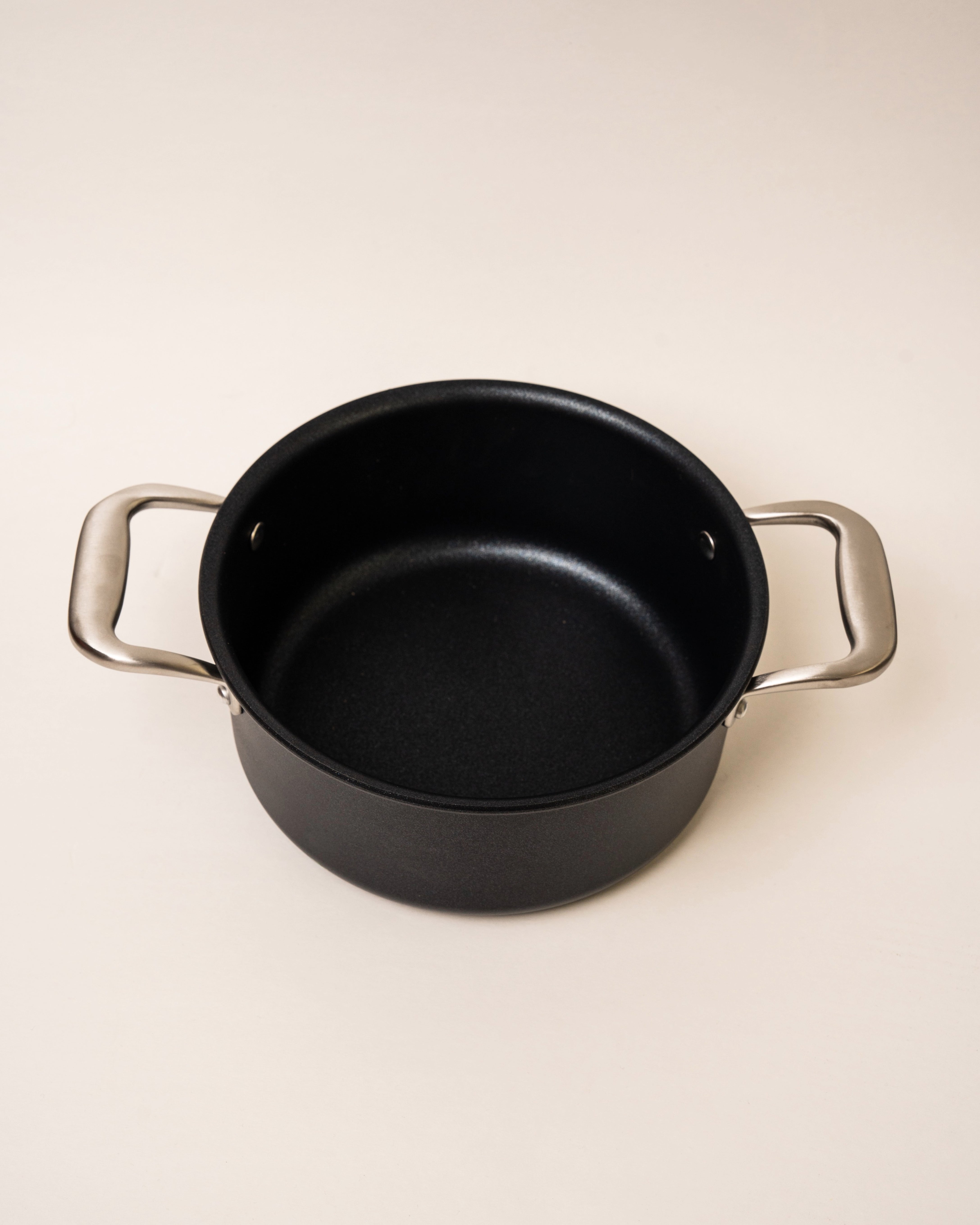Angled view of BioDiamond diamond-coated pot, 7 inch, black non-stick finish