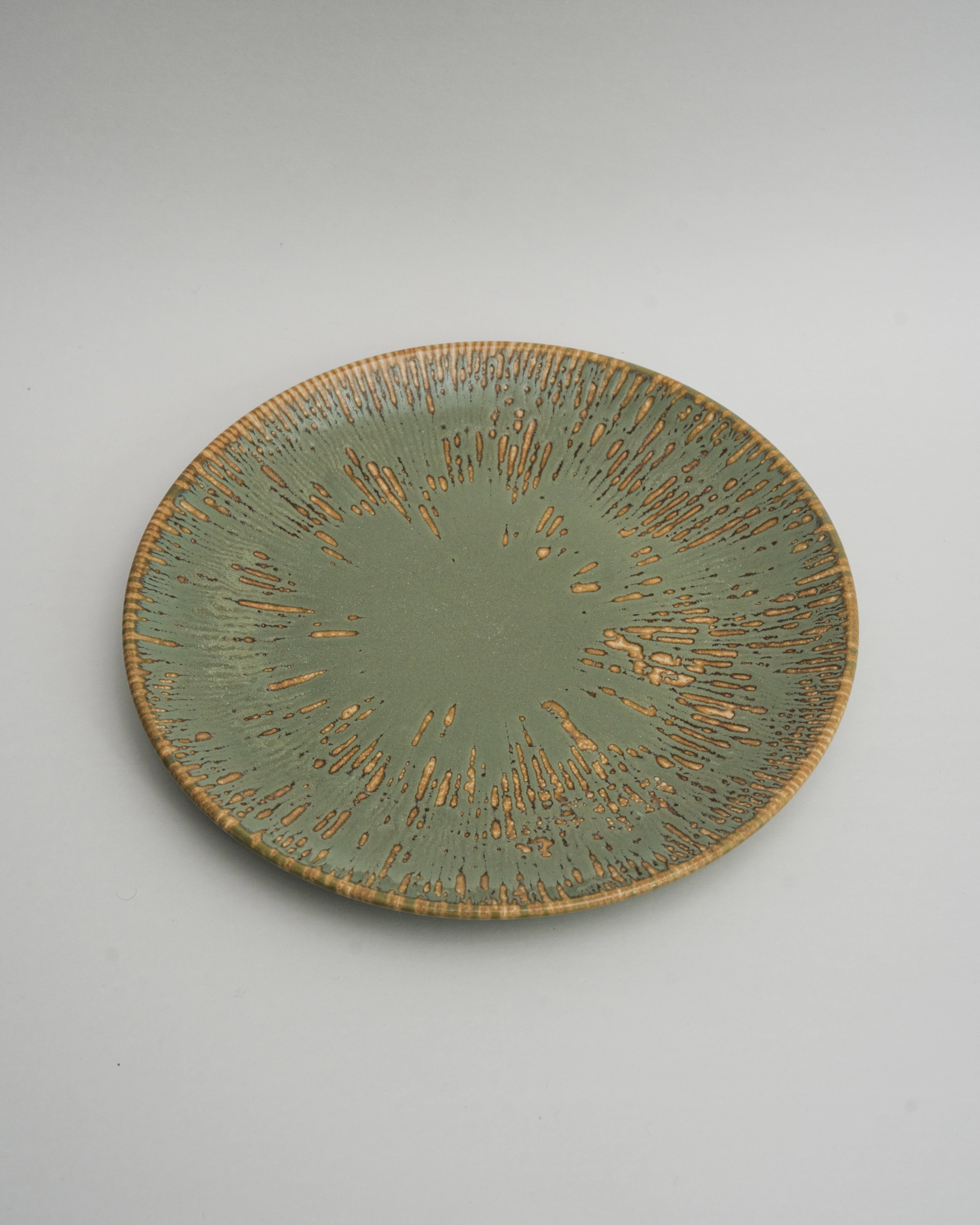 Colosseum Verdant porcelain dinner plate, olive-green glaze with gold rim, 10.6 inch