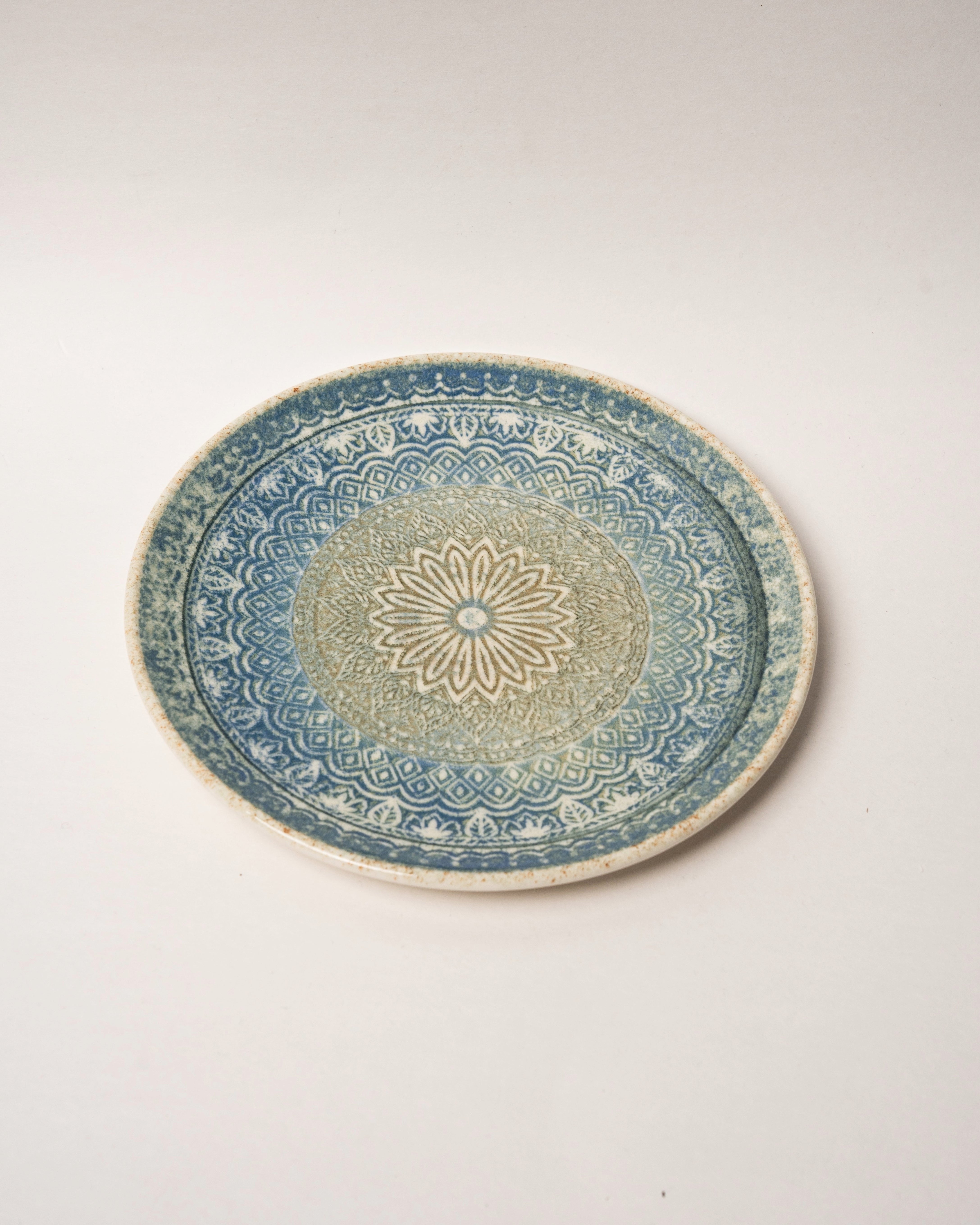 Embroideries of Atlantis porcelain plate, blue and gold embroidered pattern, 9 inch