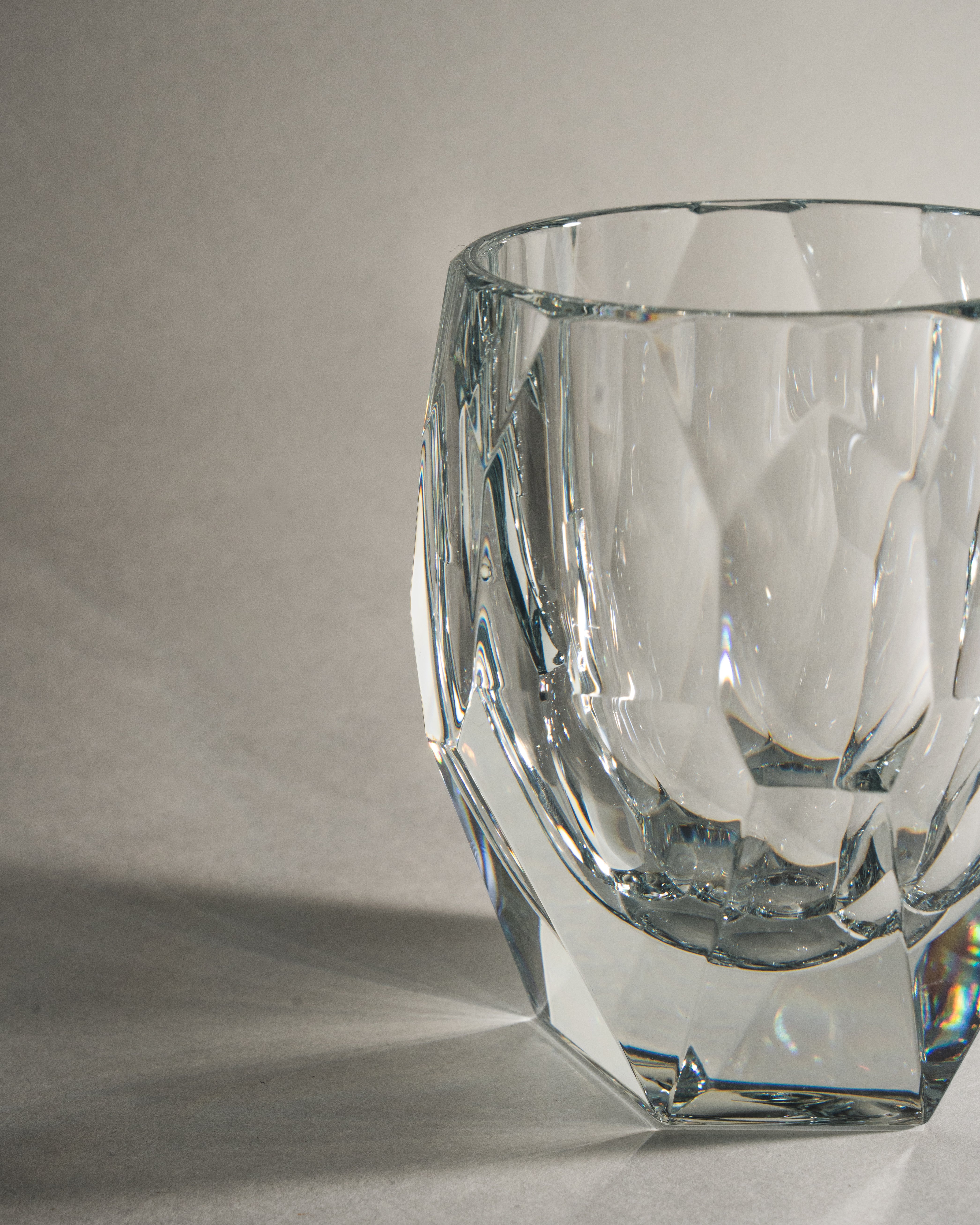 Angled view of Infinityglass Diamond whiskey glass showing facet detail