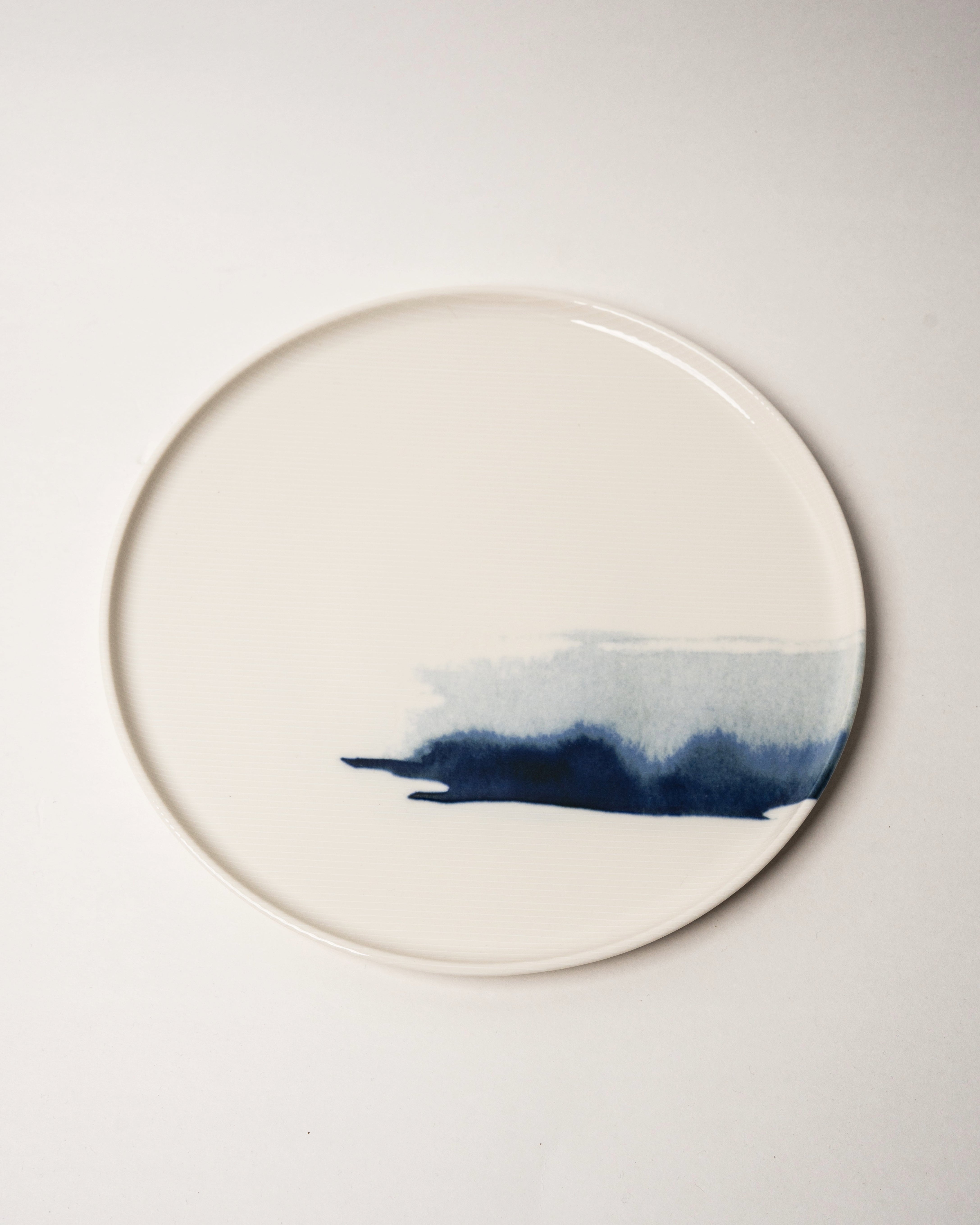 The Wave porcelain dinner plate, blue brushstroke wave pattern, 11 inch