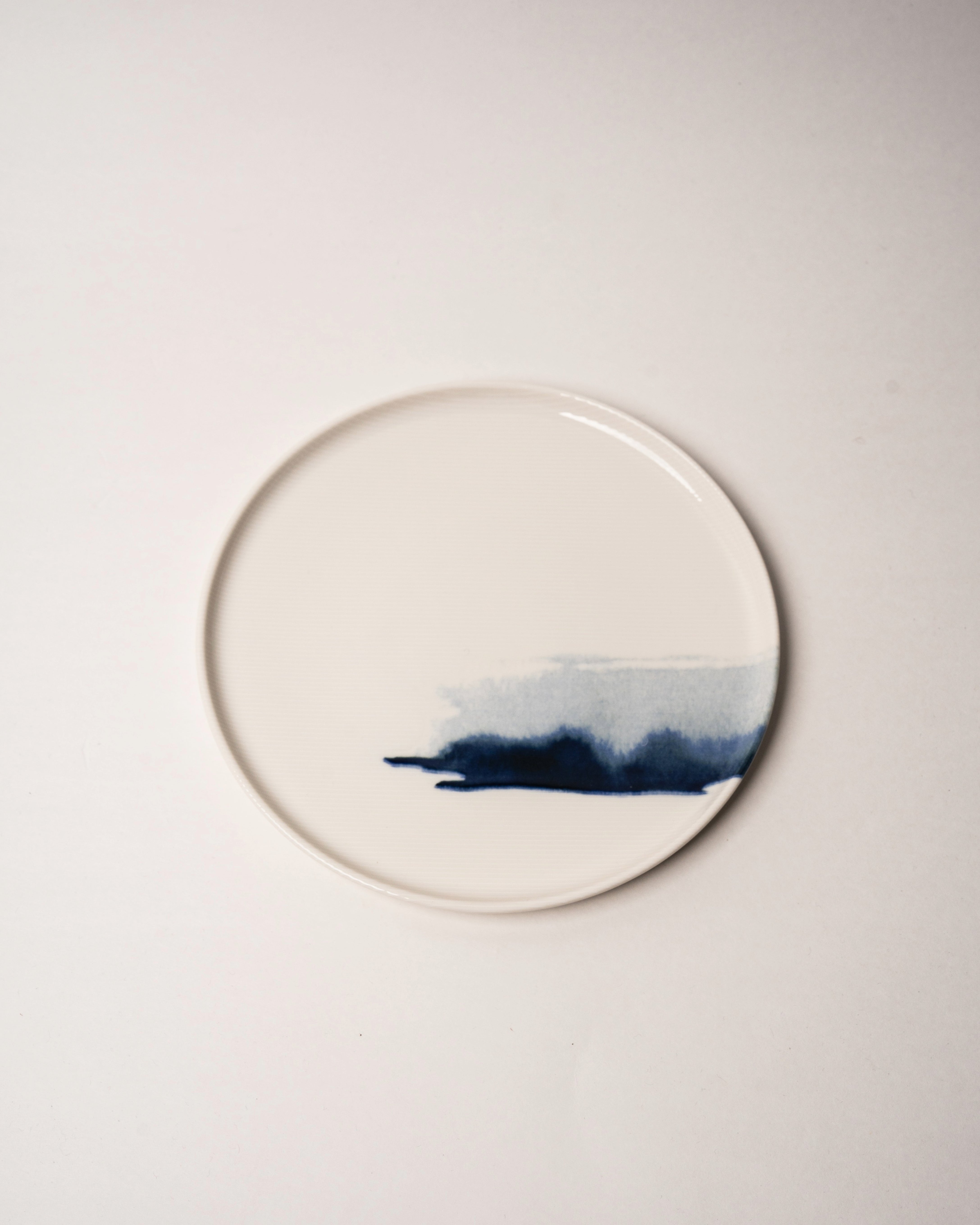 The Wave porcelain dinner plate, blue brushstroke wave pattern, 8.7 inch