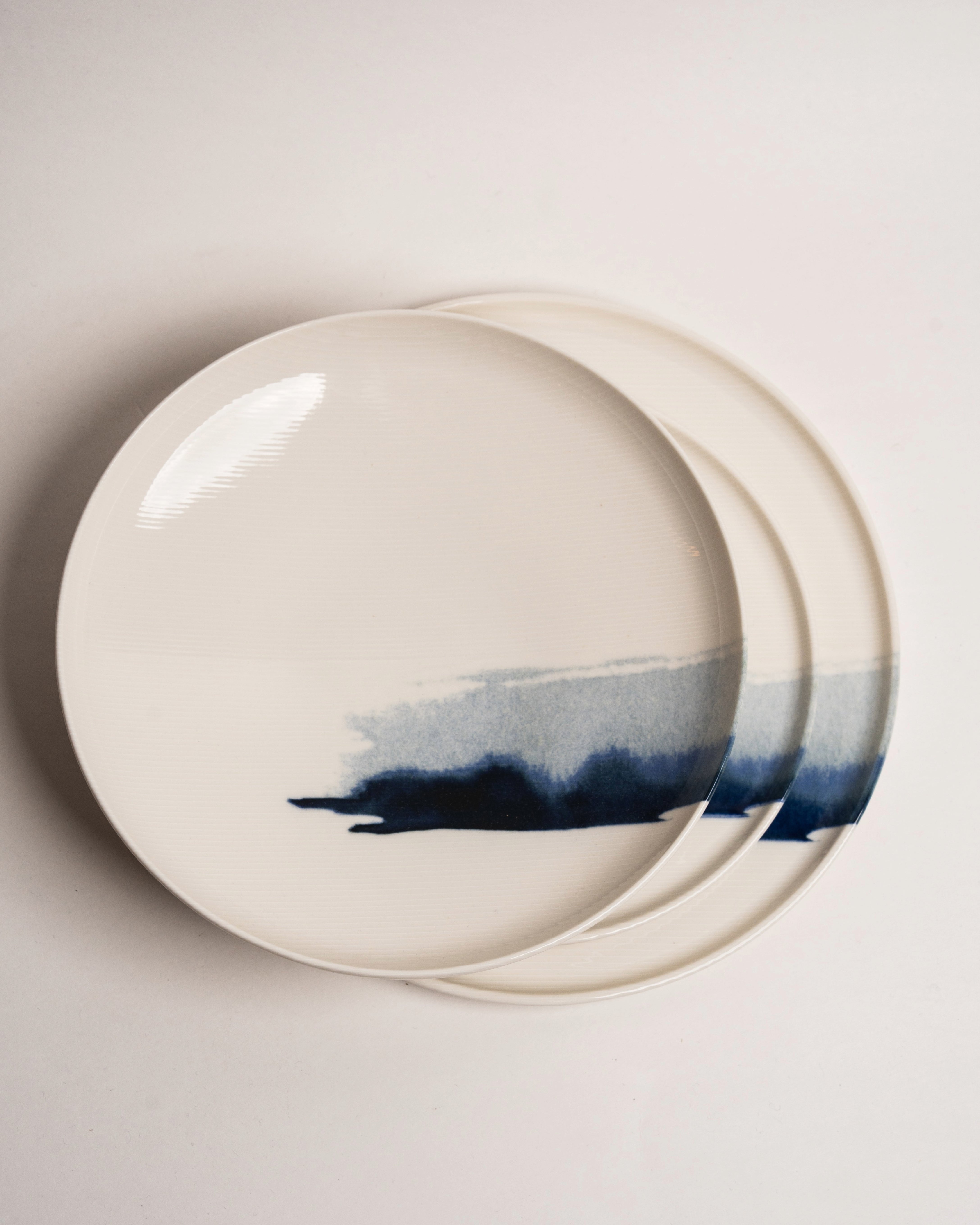 The Wave porcelain plate and bowl paired, matching wave motif